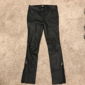 Genuine leather pants with zips at hem.